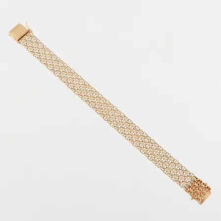 Armband X-länk Joans Köping längd ca 18.5 cm,bredd 13,6 mm,18k. Vikt: 21,7 g
