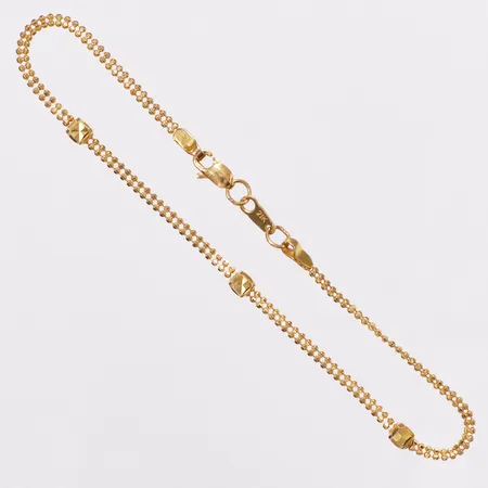 Armband kuldekor, 19cm, bredd 1,9-3,2mm, skevt, 21K  Vikt: 2,6 g