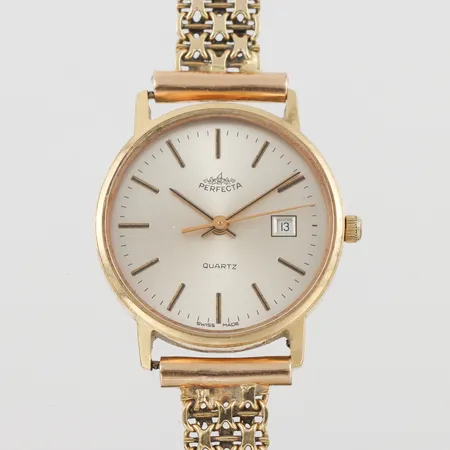 Damur Perfecta 18k i ur och länk,fungerar ej,gravyr och ojämnheter,diameter ca 25 mm,totalvikt 31.9 gram. Vikt: 31,9 g