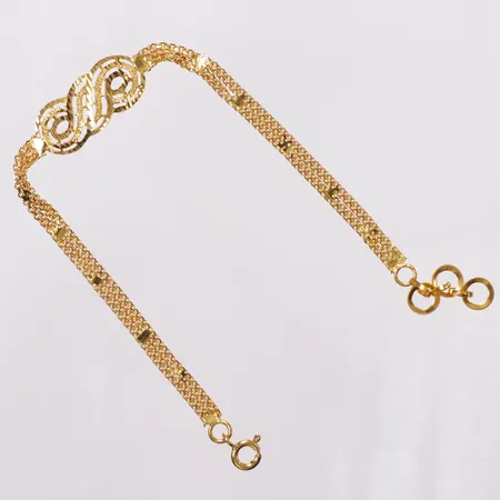 Armband X-länk, platta med dekor, 17-18,5cm, bredd 3,7-9,8mm, något skevt, 21K  Vikt: 4,6 g