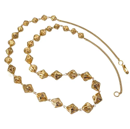 Collier, 21K guld, doserad rombformad dekor, total längd 63,5 cm, bredd 2-10 mm Vikt: 29,2 g