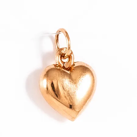 Hänge hjärta i 18K guld. Det är 14 mm långt inkl. ögla och väger 0,3g. 