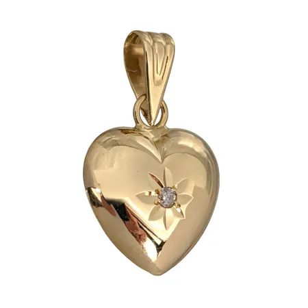 Hänge Hjärta, 18K guld, Diamant 0,005ct, längd inkl. ögla 17 mm, bredd 10 mm, tjocklek 4 mm, fint skick Vikt: 0,6 g