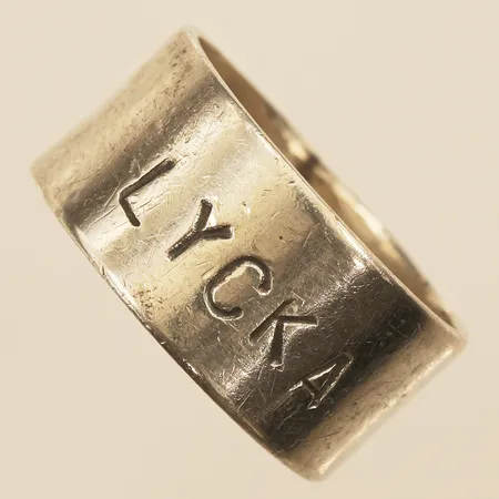 Ring lycka, stl 18, bredd 10mm, Åsa Backman, 925/1000 silver  Vikt: 6 g