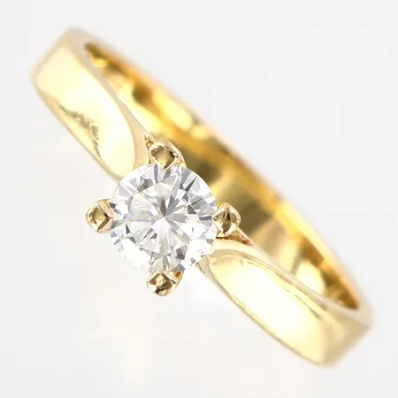 Ring med diamant 0,35ct D-E/SI, stl 16½, bredd: 2,54,5mm, 18K certifikat medföljer från Caroli Juvel Malmö 95-02-27 Vikt: 3,3 g