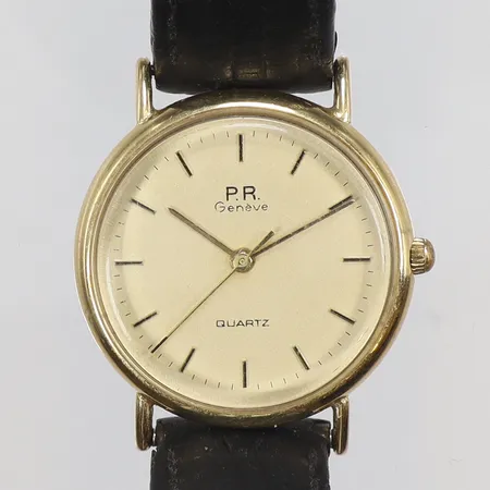 Damur PR Genevé 18K Ø25mm, quartz, går ej, repor, med läderband (defekt) guld i boett bruttovikt 15,2g 