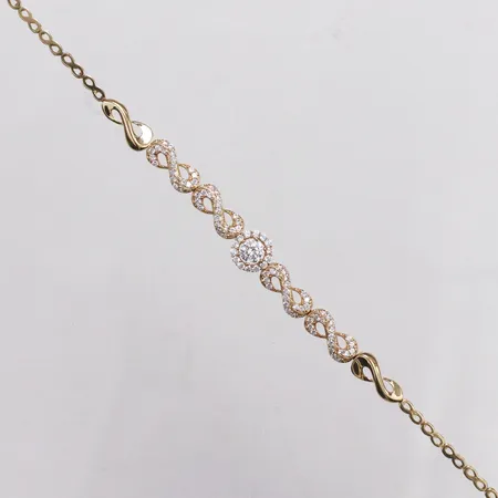 Armband halvstelt vita stenar, 17cm, bredd 2-7,3mm, 14K  Vikt: 4,9 g