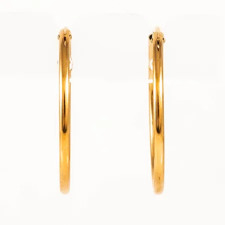 Creoler Ø 25 mm i 18K guld. De är 1,5 mm breda och väger 1,4g. 