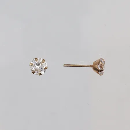 Ett par Örhängen med vita stenar Ø5mm, stoppers saknas 18K Vikt: 0,7 g