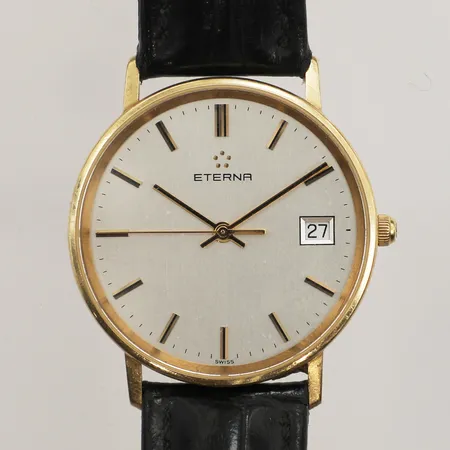 Herrur Eterna, 18K, Ø33mm, datum, gravyr, quartz, läderarmband, batteri byte krävs