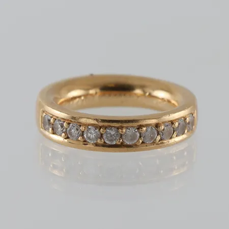 Ring 18k med stenar,Bengt Hallberg Köping,storlek 16 mm,bredd 4.9 mm,gravyr. Vikt: 12,5 g