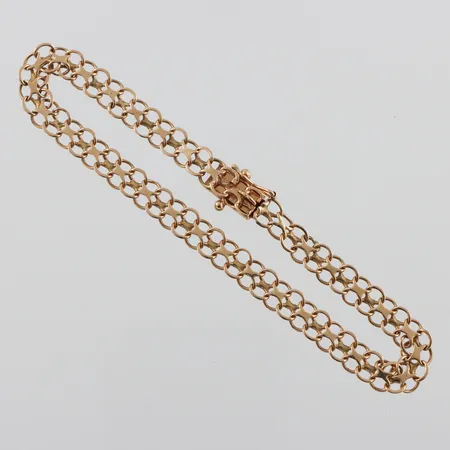 Armband X-länk 18k,bruksslitage,låsåtta saknas,längd ca 17.5 cm,bredd 5.1 mm Vikt: 4,9 g