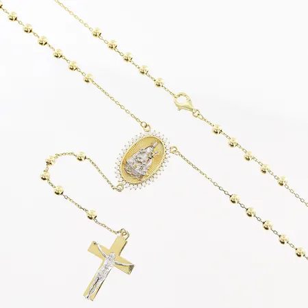 Collier med kors och religiöst motiv, kedjans längd 62,5cm, bredd 0,5-3mm, hängande del 11cm, bredd 0,5-14mm, ögla i lås i behov av lödning, 14K Vikt: 9,6 g