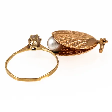 Diverse defekt guld i 18K. Vikt: 2,7g. 