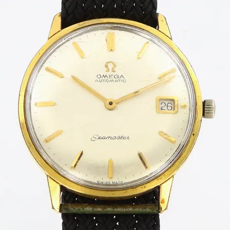 Herrur Omega Seamaster Ø34mm, guld på stål, automatisk, datumfönster, utbytt krona, repigt plastglas, tygband 