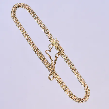 Armband X-länk, längd 16,5 cm, bredd 3 mm, 18K. Vikt: 4,9 g