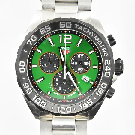 Herrur Tag Heuer Formula 1, boett Ø43 mm, quartz, datum, stål, kronograf, tachymeter, refnr CAZ101AP, serienr WTX0067, cal Ronda 5040.D, grön urtavla, vridring sitter fast, repig länk, fungerade vid testtillfället, inga tillbehör.