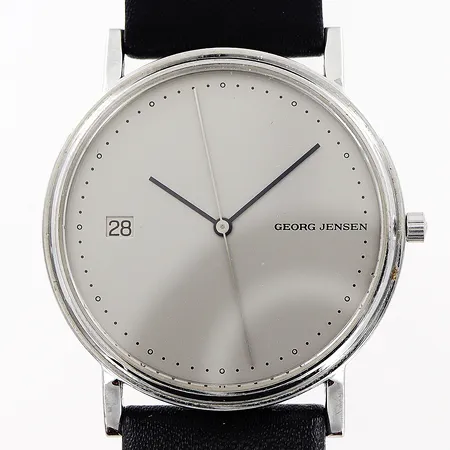 Armbandsur Georg Jensen nr 345, formgivare Jörgen Möller Danmark, stål, quartz, Ø36mm, silverfärgad urtavla, datum, sekundvisare, original läderband 24cm, i behov av batteribyte, bra skick, inga tillbehör.