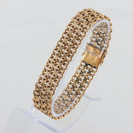 Armband X-länk 18k,Alliansguld Bäckman & Co Köping,bruksslitage,längd ca 19.5 cm,bredd 14.4 mm. Vikt: 40,3 g