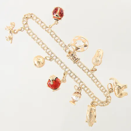 Armband Bismarck med 9 berlocker, längd: 18cm, bredd: 4,1-12,5mm, 18K  Vikt: 14,1 g