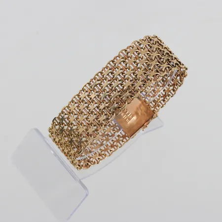 Armband 18k X-länk,Svedbom & Co AB,längd ca 18.5 cm,bredd 21.5 mm. Vikt: 43,3 g