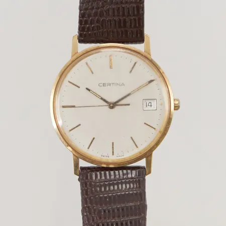 Herrur Certina 18K, 33,5mm, quartz, går ej, läderband ej original. Vikt: 0 g