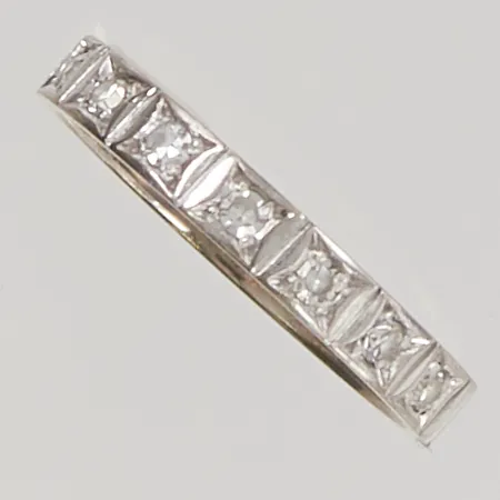 Ring diamanter 7x ca 0,02ct, Ø17, bredd:3mm, 18K 2,6g.