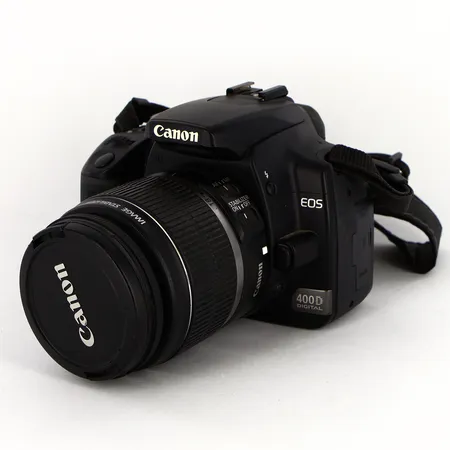 Systemkamera EOS 400D, Serienr-1881100834, batteri, laddare, USB-kabel, Objektiv Canon EF-S 18-55mm, 1:3.5-5.6 IS Ø58mm, Serienr-3311024053, väska medföljer