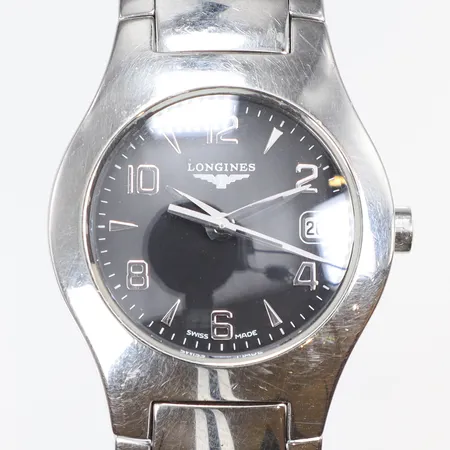 Damur Longines Ø25mm ref nr. L3.125.4 snr.  30901261, quartz, går ej (troligen batteribyte), stållänk, datum, inga tillbehör, med repor