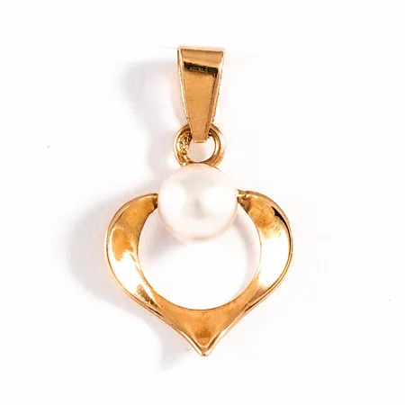 Hänge Hjärta i 18K guld med en odlad vit pärla Ø 4,5 mm. Det är 10 mm brett, 16,5 mm långt inkl ögla och väger 0,4g. 