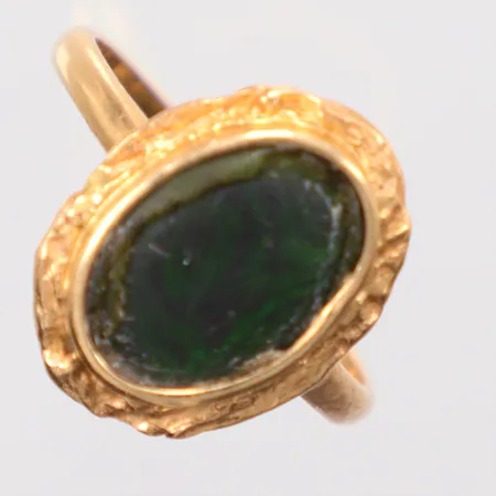 Ring med spectrolite, Ø19¼, 18K. Vikt: 3 g