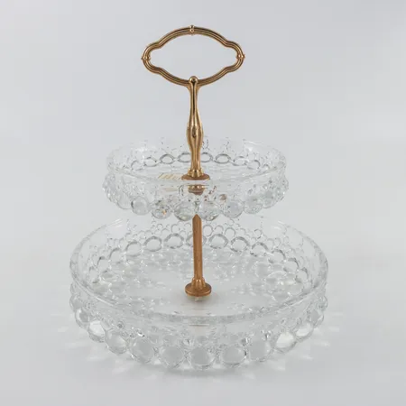 Etagekakfat glas och metall,etikettmärkt Walther Germany,höjd ca 25 cm,diameter 23 cm. Skickas med postpaket.