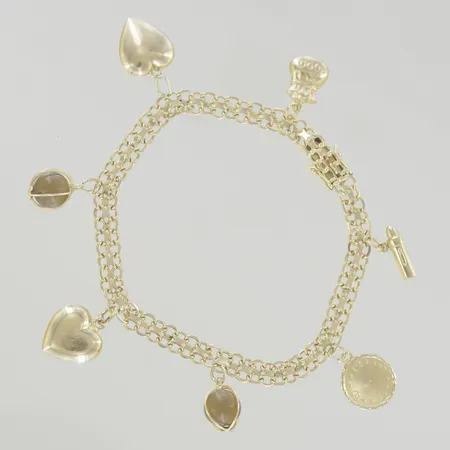 Armband med berlocker, längd 19, cm bredd 5 mm, 18K Vikt: 14,9 g