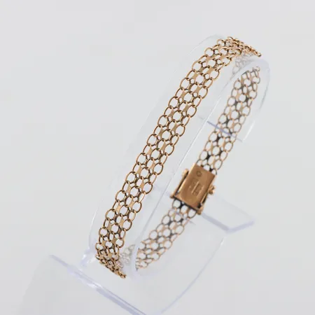 Armband X-länk 18k,slitna länkar,Tore Clareus Stockholm,längd ca 19 cm,bredd 7.9 mm. Vikt: 7,8 g