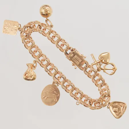 Armband Bismarck 17,5cm, bredd:10mm, 6 berlocker, 18K 30,1g.