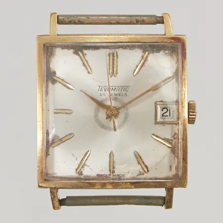 Herrur Tevomatic 18K, 27mm, automatisk, servicebehov, bruttovikt 26,2g.