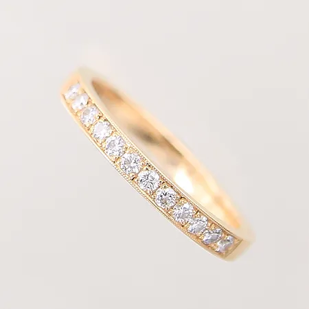 Ring med diamanter 12 x ca 0,02ct, stl 17¼, bredd 2,5mm, 18K Vikt: 3,4 g