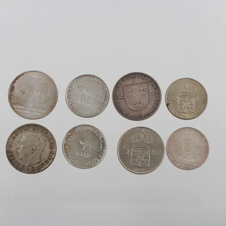 Mynt 50 kr 1976,2-krona 1938,2 krona 1964,5 krona 1952,5 krona 1955,2 st 10 kronor 1972,5 kronor 1935. Vikt: 158,2 g