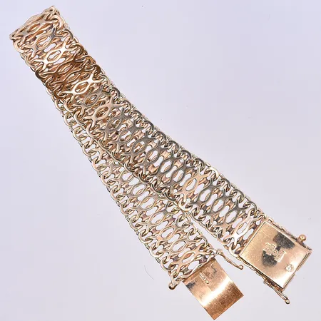 Armband, längd 19 cm, bredd 14 mm, 18K. Vikt: 26,8 g