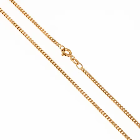 Kedja Pansar i 18K guld. Den är 42 cm lång, 2 mm bred och väger 6,6g. Springring.  