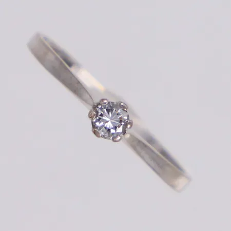 Ring med diamant 1xca0,10ct ca W(H)/Si, stl 16¼, bredd 1,5-3,5mm, vitguld, 18K Vikt: 1,2 g