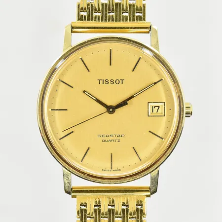 Herrur Tissot Seastar 14K, boett Ø34 mm, quartz, datum, länk i doublé, behov av batteribyte, graverad bakboett, bruttovikt 51,9g.