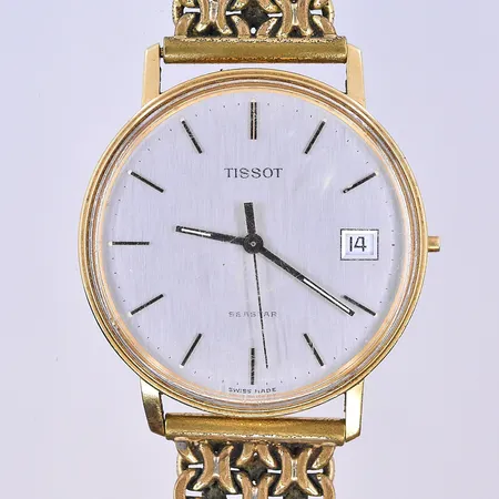 Herrur Tissot Seastar, quartz, datum, Ø34 mm, graverad boett, 18K, krona borta, metall band. Bruttovikt 52,5g.