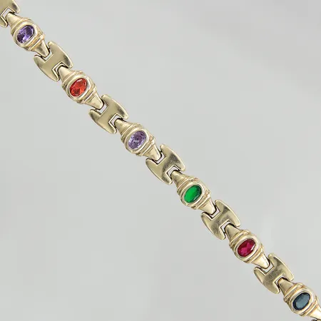 Armband med färgade stenar 14K, längd 19,5cm, bredd 8,4-9,0mm, Balestra lås samt öglor i 18K, nagg samt repiga stenar Vikt: 24,2 g