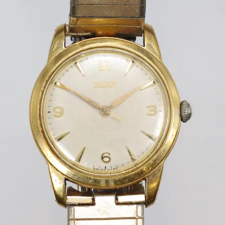 Herrur Tissot Ø34mm, manuell uppdragning, 1950/60-tal, hårt slitage och smuts, utbytt krona, guld på stål, repigt glas, defekt länk 