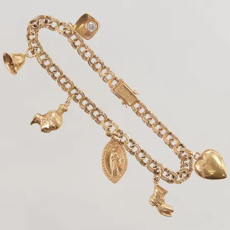 Armband Bismarck 18,5cm, bredd:5mm, berlocker, 18K 13,7g.