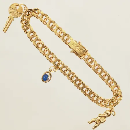 Armband Bismarck med tre berlocker, längd 19cm, bredd 6,3mm, 18K  Vikt: 15,8 g