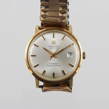 Herrur 18k Tissot Visodate Seastar Seven,tickar igång men ej funktionstestad,diameter ca 34 mm.
