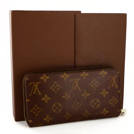 Plånbok Louis Vuitton Wallet Zippy, monogram canvas,  Datumkod CA2154 år 2014 Spanien, 2x10x20cm, detaljer i gulmetall med smärre slitage, dustbag, kvitto från LV Stockholm, box medföljer