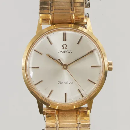 Herrur Omega Genève 18K, 33mm, manuell, gravyr, original glas samt krona, personlig gravyr, flexband i doublé.